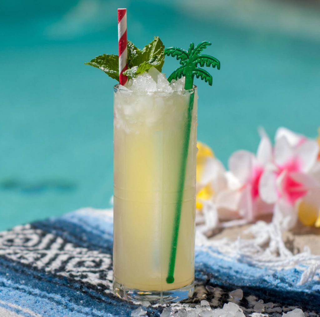 (revel swizzle) Add Blanco agave liquor to this cocktail for a taste of the tropics.